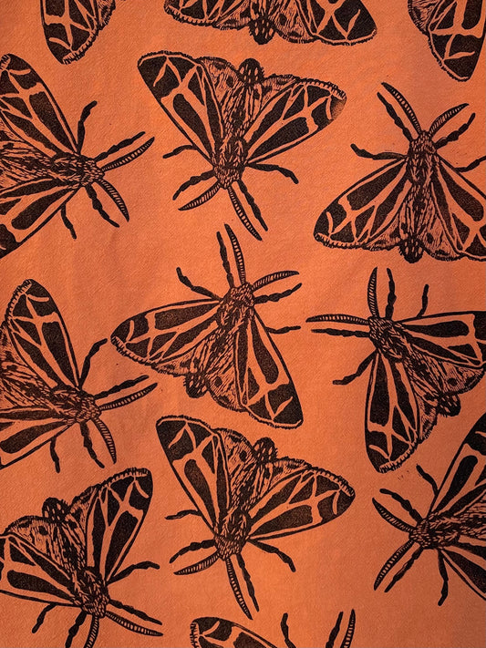 Cotton Tea Towel: Harnessed Tiger Moth on Orange
