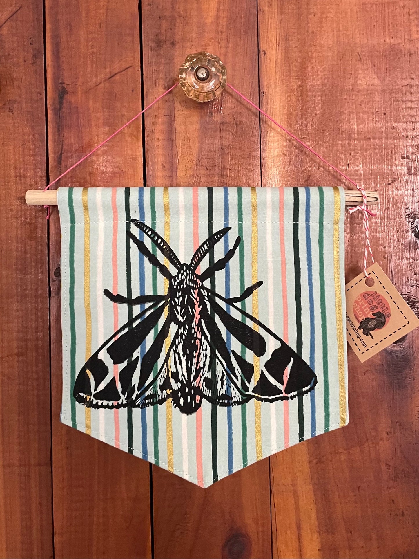 Tiny Banner with Eastern Harnessed Tiger Moth